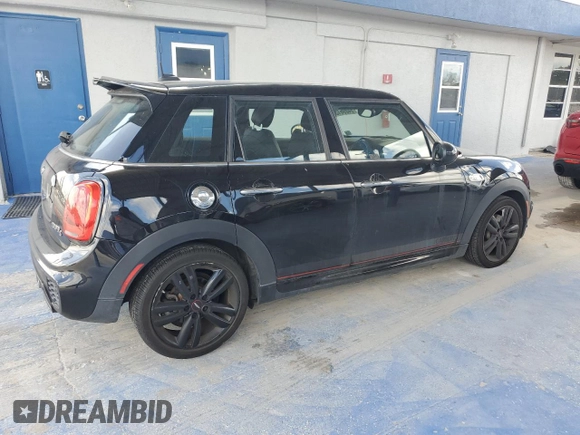 2018 MINI Hardtop 4 Door Cooper S with VIN WMWXU3C54J2F51176, listed as a Copart auction lot 64896135 with 16,418 mi miles and Salvage title. Bid and sale history available at DreamBid. Image 3.