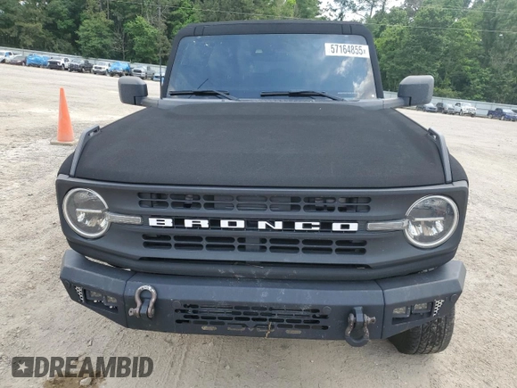 2021 Ford Bronco z VIN 1FMEE5BP4MLA90588, wystawiony jako Copart lot #57164855 z przebiegiem 22 550 mil mil oraz Szkoda całkowita • Salvage title. Historia ofert i sprzedaży dostępna na DreamBid. Obrazek 5.