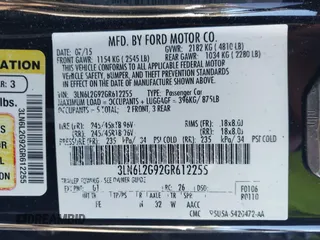 2016 Lincoln MKZ z VIN 3LN6L2G92GR612255, wystawiony jako IAAI lot #41647296 z przebiegiem 130 996 mil mil oraz . Historia ofert i sprzedaży dostępna na DreamBid. Obrazek 9.