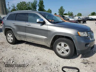 2011 Jeep Grand Cherokee Laredo with VIN 1J4RR4GG8BC610361, listed as a Copart auction lot 59089405 with 138,402 mi miles and Clean title. Bid and sale history available at DreamBid. Image 4.