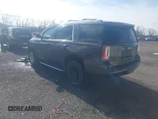 2016 GMC Yukon SLE with VIN 1GKS2AKC9GR273724, listed as a IAAI auction lot 41945761 with 141,425 mi miles. Bid and sale history available at carsss.com. Image 3.