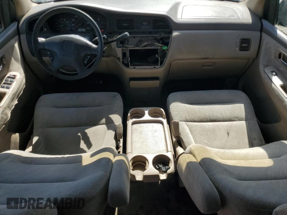2000 Honda Odyssey EX z VIN 2HKRL1867YH587616, wystawiony jako Copart lot #57258795 z przebiegiem 219 999 mil mil oraz Szkoda całkowita • Salvage title. Historia ofert i sprzedaży dostępna na DreamBid. Obrazek 8.