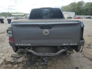 2017 Nissan Titan Platinum Reserve z VIN 1N6AA1E56HN571502, wystawiony jako Copart lot #56751155 z przebiegiem 105 017 mil mil oraz Szkoda całkowita • Salvage title. Historia ofert i sprzedaży dostępna na DreamBid. Obrazek 6.