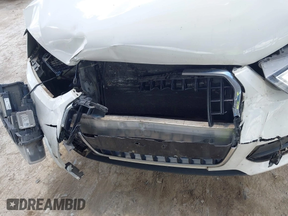 2015 Audi Q3 Prestige with VIN WA1GFCFS1FR007092, listed as a IAAI auction lot 42588730 with 85,290 mi miles and . Bid and sale history available at DreamBid. Image 6.
