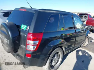 2008 Suzuki Grand Vitara Luxury z VIN JS3TE947984100162, wystawiony jako IAAI lot #41483629 z przebiegiem 140 339 mil mil oraz . Historia ofert i sprzedaży dostępna na DreamBid. Obrazek 14.
