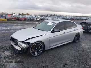 2013 BMW 3 Series 335i with VIN WBA3A9C50DF475024, listed as a IAAI auction lot 40884045 with 120,121 mi miles. Bid and sale history available at carsss.com. Image 2.