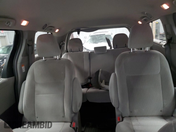 2016 Toyota Sienna LE with VIN 5TDJK3DC2GS129739, listed as a Copart auction lot 86125854 with 74,058 mi miles and Salvage Title. Bid and sale history available at carsss.com. Image 10.