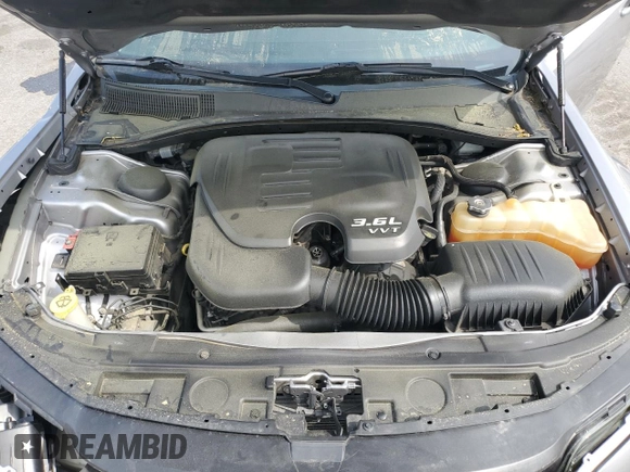 2016 Chrysler 300 Limited z VIN 2C3CCAAG1GH233711, wystawiony jako Copart lot #53933315 z przebiegiem 246 395 mil mil oraz Szkoda całkowita • Salvage title. Historia ofert i sprzedaży dostępna na DreamBid. Obrazek 11.