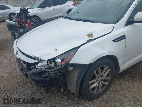 2013 Kia Optima LX z VIN KNAGM4A79D5304780, wystawiony jako IAAI lot #42277179 z przebiegiem 139 841 mil mil oraz . Historia ofert i sprzedaży dostępna na DreamBid. Obrazek 14.