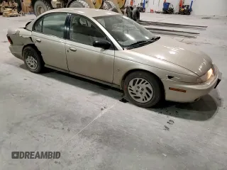 1999 Saturn SL с VIN 1G8ZK5278XZ269792, выставлен на аукционе Copart как лот 48773395 с пробегом 159 506 миль миль и Списание • Salvage title. История ставок и продаж доступна на DreamBid. Изображение 11.