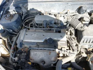 2005 Hyundai Accent GLS with VIN KMHCG35C95U365902, listed as a IAAI auction lot 41715161 with 149,766 mi miles. Bid and sale history available at carsss.com. Image 10.