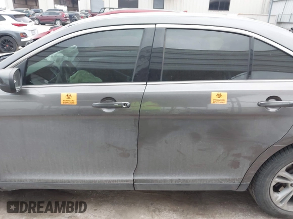 2015 Ford Taurus SEL z VIN 1FAHP2E85FG209085, wystawiony jako IAAI lot #41944532 z przebiegiem 143 850 mil mil oraz . Historia ofert i sprzedaży dostępna na DreamBid. Obrazek 14.