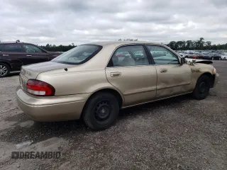 1998 Mazda 626 DX with VIN 1YVGF22CXW5733338, listed as a Copart auction lot 71796184 with 196,218 mi miles and Salvage Title. Bid and sale history available at carsss.com. Image 3.