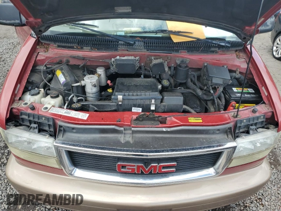 2001 GMC Safari z VIN 1GKEL19W61B514522, wystawiony jako Copart lot #57143155 z przebiegiem Nie podano mil oraz Szkoda całkowita • Salvage title. Historia ofert i sprzedaży dostępna na DreamBid. Obrazek 12.