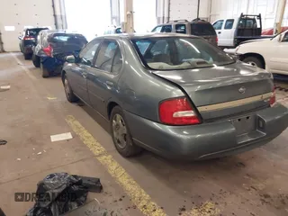 2000 Nissan Altima XE with VIN 1N4DL01D4YC185986, listed as a IAAI auction lot 41831774 with 217,044 mi miles. Bid and sale history available at carsss.com. Image 3.