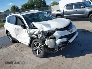 2018 Toyota RAV4 XLE with VIN JTMWFREV8JJ157496, listed as a IAAI auction lot 42249948 with 64,767 mi miles and . Bid and sale history available at DreamBid. Image 1.