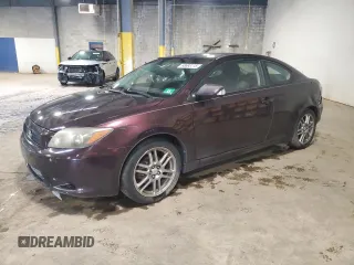 2008 Scion tC Spec with VIN JTKDE167580265188, listed as a Copart auction lot 65693115 with 156,502 mi miles and Salvage title. Bid and sale history available at DreamBid. Image 1.
