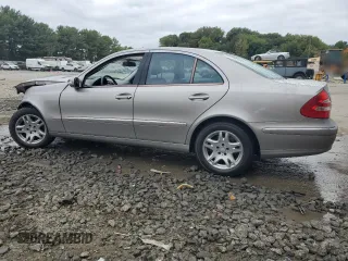 2004 Mercedes-Benz E-Class 3.2L with VIN WDBUF82J34X161443, listed as a Copart auction lot 72807674 with 197,204 mi miles and Salvage Title. Bid and sale history available at carsss.com. Image 2.