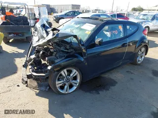 2014 Hyundai Veloster with VIN KMHTC6AD3EU184600, listed as a IAAI auction lot 41300088 with 1 mi miles. Bid and sale history available at carsss.com. Image 2.