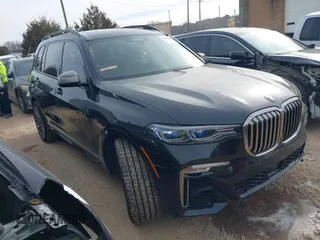 2021 BMW X7 M50i with VIN 5UXCX6C07M9G39230, listed as a IAAI auction lot 41409366 with 63,965 mi miles. Bid and sale history available at carsss.com. Image 14.