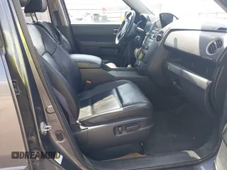 2013 Honda Pilot EX-L with VIN 5FNYF4H61DB035588, listed as a IAAI auction lot 41882840 with 144,243 mi miles and . Bid and sale history available at carsss.com. Image 5.