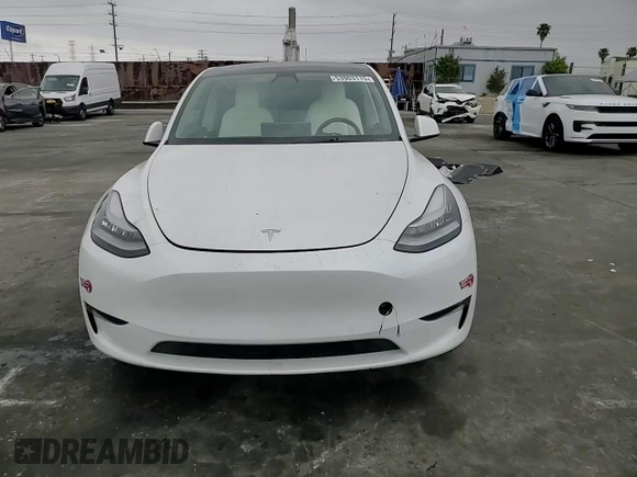 2021 Tesla Model Y Long Range with VIN 5YJYGDEEXMF151686, listed as a Copart auction lot 53903115 with 65,321 mi miles and Salvage Title. Bid and sale history available at DreamBid. Image 14.