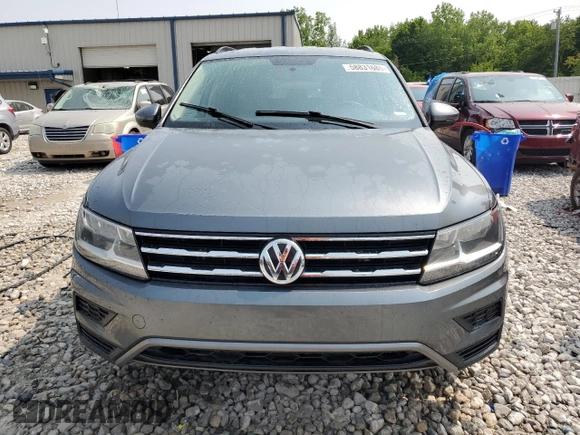 2018 Volkswagen Tiguan S with VIN 3VV0B7AXXJM131760, listed as a Copart auction lot 58831685 with 124,431 mi miles and Salvage title. Bid and sale history available at DreamBid. Image 5.