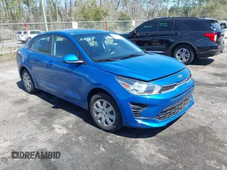 2021 Kia Rio S with VIN 3KPA24AD7ME430595, listed as a IAAI auction lot 41792608 with 57,342 mi miles. Bid and sale history available at carsss.com. Image 1.