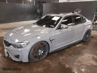2018 BMW M3 with VIN WBS8M9C53J5J79991, listed as a IAAI auction lot 41881835 with 59,668 mi miles. Bid and sale history available at carsss.com. Image 2.