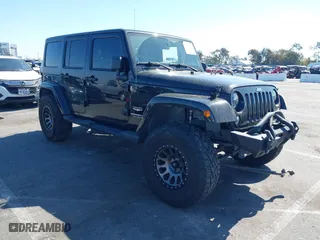 2013 Jeep Wrangler Unlimited Sahara with VIN 1C4BJWEG0DL666150, listed as a IAAI auction lot 41661676 with 112,346 mi miles. Bid and sale history available at carsss.com. Image 1.