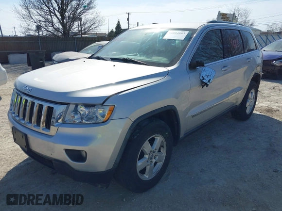 2011 Jeep Grand Cherokee Laredo z VIN 1J4RR4GG3BC589578, wystawiony jako IAAI lot #41804883 z przebiegiem 113 016 mil mil oraz . Historia ofert i sprzedaży dostępna na DreamBid. Obrazek 19.