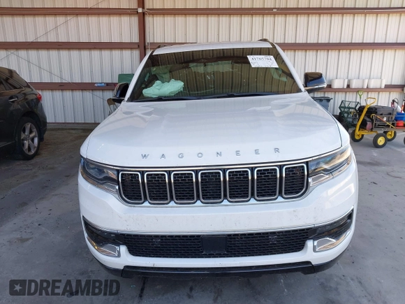 2023 Jeep Grand Wagoneer with VIN 1C4SJUAT5PS509425, listed as a IAAI auction lot 41765704 with 65,656 mi miles and . Bid and sale history available at DreamBid. Image 12.