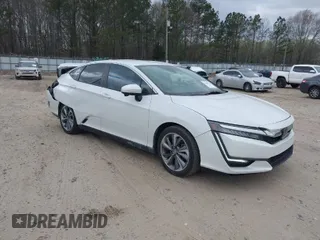 2018 Honda Clarity Plug-In Hybrid Touring with VIN JHMZC5F38JC001442, listed as a IAAI auction lot 41848328 with 99,156 mi miles. Bid and sale history available at carsss.com. Image 1.