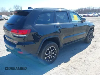 2021 Jeep Grand Cherokee Trailhawk with VIN 1C4RJFLGXMC698606, listed as a IAAI auction lot 41901479 with 50,086 mi miles. Bid and sale history available at carsss.com. Image 4.