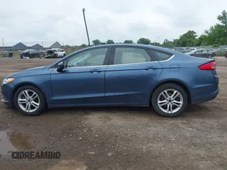 2018 Ford Fusion SE with VIN 3FA6P0HD9JR192927, listed as a IAAI auction lot 42616919 with 90,623 mi miles and . Bid and sale history available at DreamBid. Image 14.