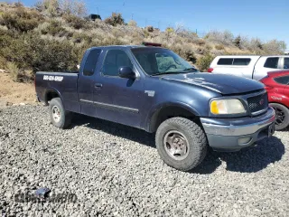 2000 Ford F-150 XL with VIN 1FTRX18L7YKA42575, listed as a Copart auction lot 73034804 with 263,959 mi miles and Non repairable. Bid and sale history available at DreamBid. Image 4.