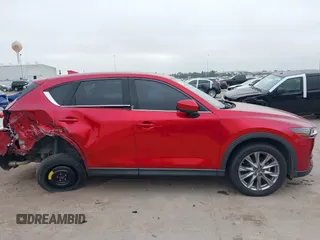 2020 Mazda CX-5 Grand Touring with VIN JM3KFADM7L0729537, listed as a IAAI auction lot 41864569 with 82,998 mi miles. Bid and sale history available at carsss.com. Image 14.