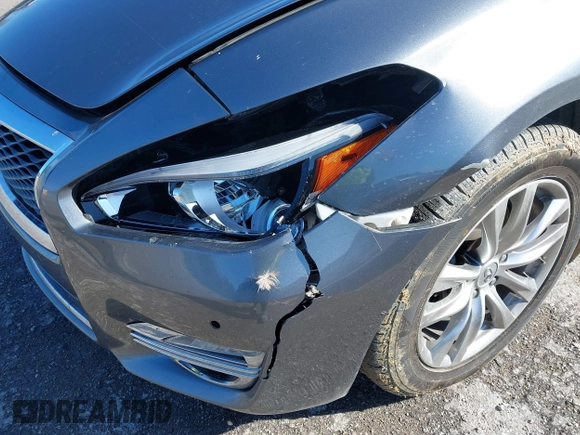 2018 Infiniti Q70 Luxe with VIN JN1BY1AR3JM220783, listed as a IAAI auction lot 41480241 with 95,739 mi miles and . Bid and sale history available at DreamBid. Image 6.
