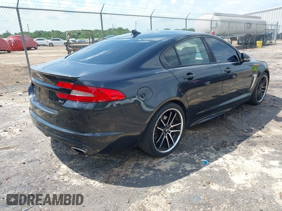 2015 Jaguar XF V6 Portfolio with VIN SAJWA0F74F8U76324, listed as a IAAI auction lot 42158134 with 136,995 mi miles. Bid and sale history available at carsss.com. Image 4.