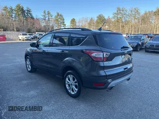 2018 Ford Escape SE with VIN 1FMCU9GD8JUA76991, listed as a IAAI auction lot 42013849 with 213,827 mi miles. Bid and sale history available at carsss.com. Image 3.