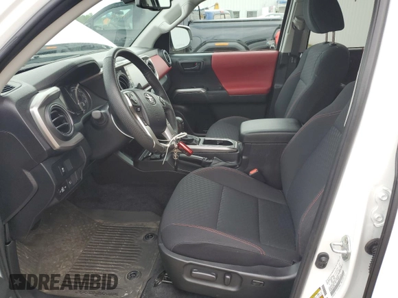 2023 Toyota Tacoma SR with VIN 3TMCZ5AN2PM642205, listed as a Copart auction lot 61045955 with 10,596 mi miles and Salvage title. Bid and sale history available at DreamBid. Image 7.