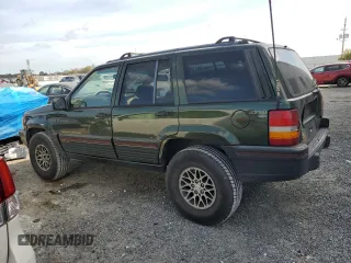 1995 Jeep Grand Cherokee Limited with VIN 1J4GZ78Y4SC788283, listed as a Copart auction lot 47796545 with 283,087 mi miles and Salvage Title. Bid and sale history available at carsss.com. Image 2.