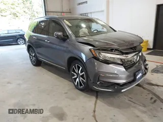 2021 Honda Pilot Touring 8-Passenger with VIN 5FNYF6H95MB048527, listed as a IAAI auction lot 42542138 with 40,584 mi miles and . Bid and sale history available at DreamBid. Image 1.