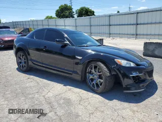 2009 Mazda RX-8 Sport with VIN JM1FE174190403105, listed as a Copart auction lot 60619384 with 49,644 mi miles and Salvage Title. Bid and sale history available at carsss.com. Image 4.
