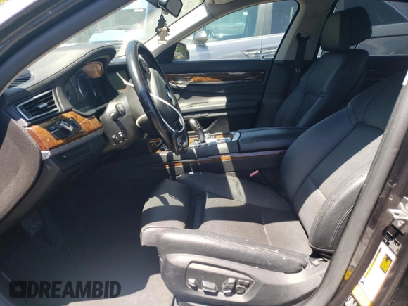 2013 BMW 7 Series 740Li xDrive z VIN WBAYF4C55DDE23588, wystawiony jako Copart lot #57968395 z przebiegiem 53 166 mil mil oraz Szkoda całkowita • Salvage title. Historia ofert i sprzedaży dostępna na DreamBid. Obrazek 7.