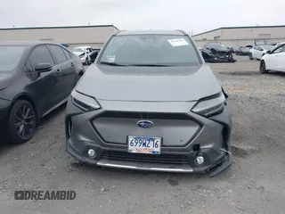 2024 Subaru Solterra Premium z VIN JTMABABA2RA056054, wystawiony jako IAAI lot #42018399 z przebiegiem 6 220 mil mil oraz . Historia ofert i sprzedaży dostępna na DreamBid. Obrazek 13.