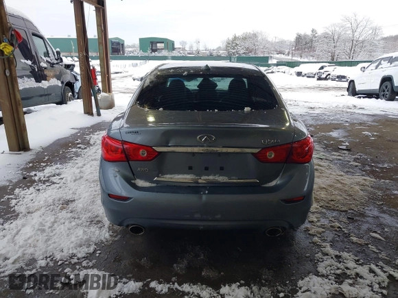 2015 Infiniti Q50 Premium with VIN JN1BV7AR4FM399046, listed as a IAAI auction lot 41560885 with 143,488 mi miles and . Bid and sale history available at DreamBid. Image 16.