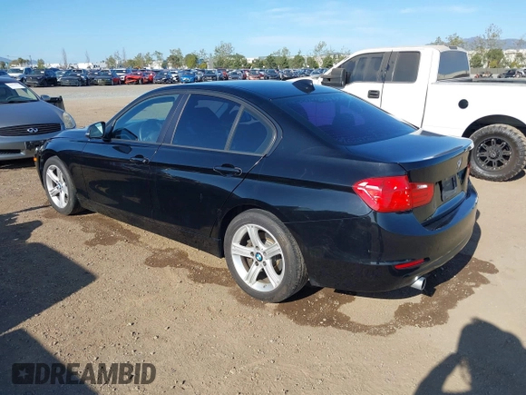 2013 BMW 3 Series 320i with VIN WBA3B1C57DF461779, listed as a IAAI auction lot 41991156 with 134,592 mi miles. Bid and sale history available at carsss.com. Image 3.
