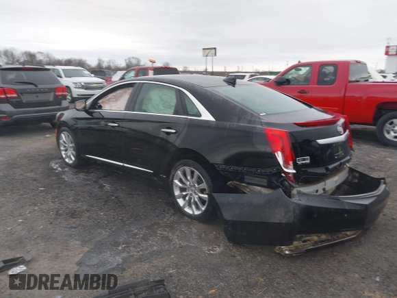 2015 Cadillac XTS Luxury with VIN 2G61M5S38F9138545, listed as a IAAI auction lot 41690696 with 136,460 mi miles and . Bid and sale history available at DreamBid. Image 3.