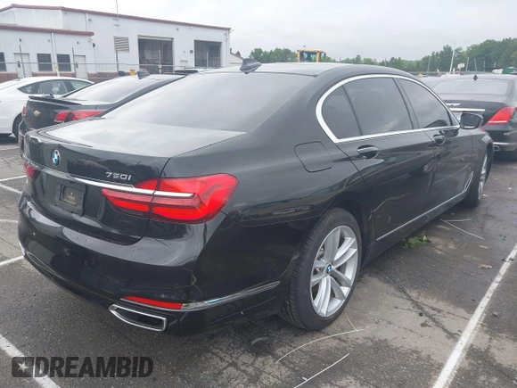 2018 BMW 7 Series 750i z VIN WBA7F0C59JGM23945, wystawiony jako IAAI lot #42236737 z przebiegiem 65 576 mil mil oraz . Historia ofert i sprzedaży dostępna na DreamBid. Obrazek 4.
